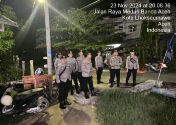 Polres Lhokseumawe Amankan Kampanye Pilkada Nomor urut 3 di Meunasah Mesjid