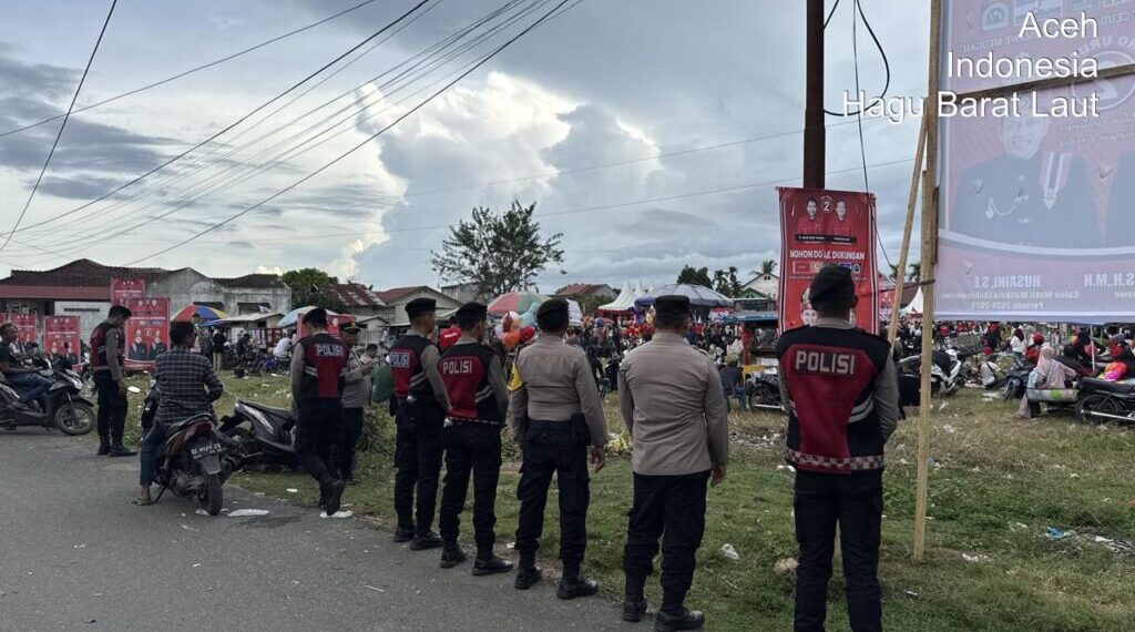 Polres Lhokseumawe Kerahkan Personil Amankan Kampanye Paslon Pilkada Nomor urut 2 di Hagu Barat Laut